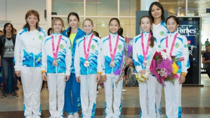 Көркем гимнастикадан Нанкин-2014 жүлдегерлері Астанаға оралды